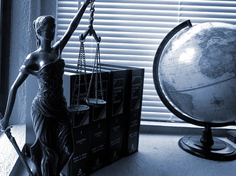 Lady Justice Statue with Law Books and Globe