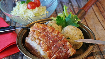 Traditional Bavarian Pork Roast with Dumplings and Coleslaw