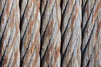 Close-up texture of rusty braided steel cables