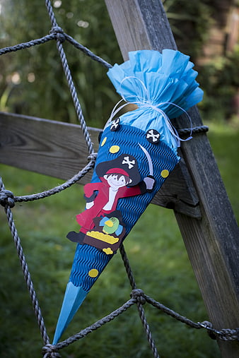 Pirate Themed Paper Cone Gift On Playground Climbing Frame