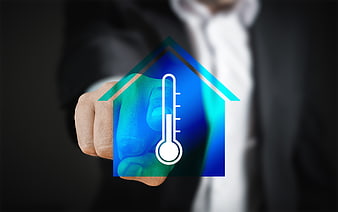 Businessman touching smart home temperature control icon