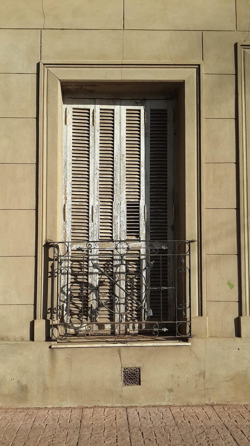 Old European Window with Shutters and Iron Balcony