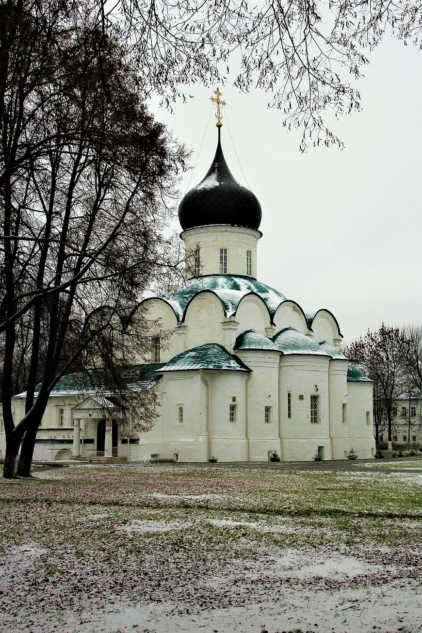 White Russian Orthodox Church with Black Dome in Snow