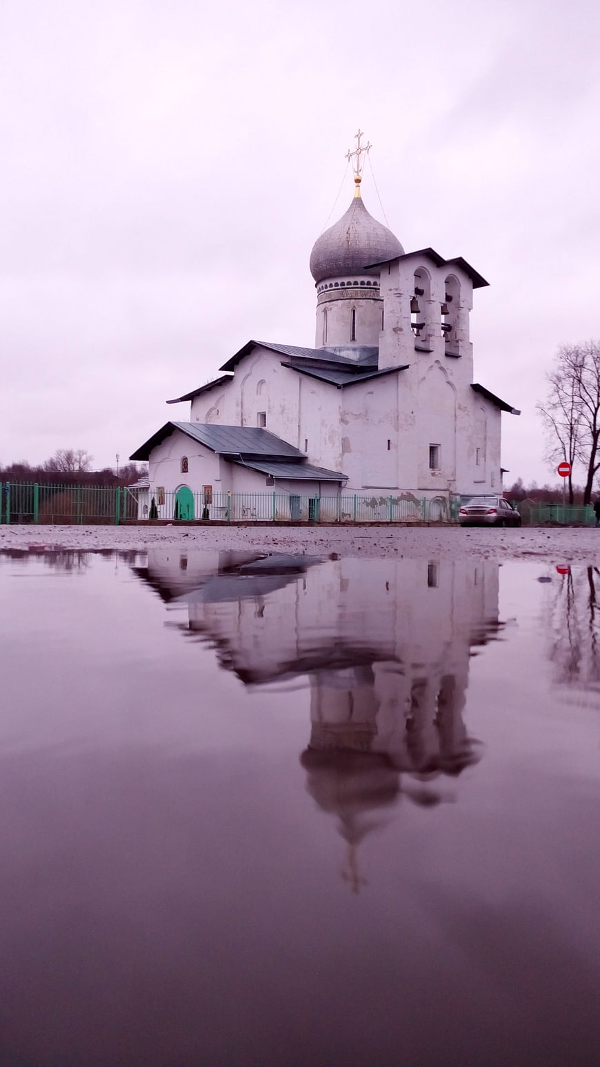 Orthodox Church Reflection in Puddle