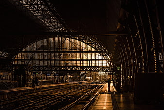 Silhouette of Train Station Interior with Golden Hour Light