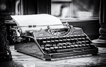 Vintage Continental Typewriter With Paper On Marble Surface
