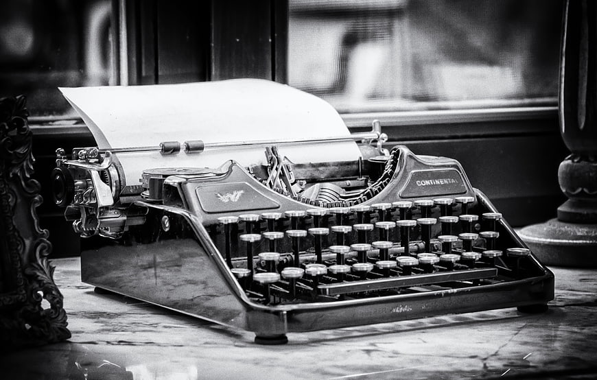 Vintage Continental Typewriter With Paper On Marble Surface