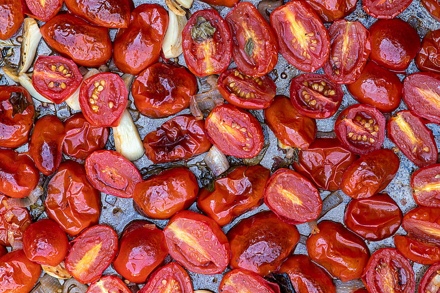 Roasted Cherry Tomatoes and Garlic on Baking Sheet