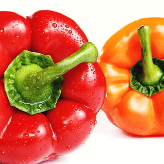 Fresh Red and Orange Bell Peppers with Water Droplets