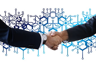 Business handshake with blue digital network background