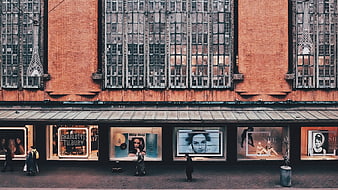 High Angle View of Brick Building with Fashion Storefronts