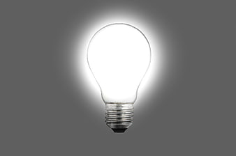 Glowing Light Bulb on Gray Background