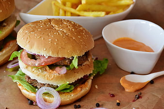 Delicious Double Cheeseburger with Fries and Sauce