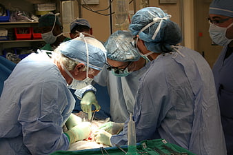 Medical Team Performing Organ Transplant Surgery in Operating Room