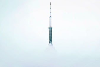 CN Tower Emerging from Thick Fog in Toronto