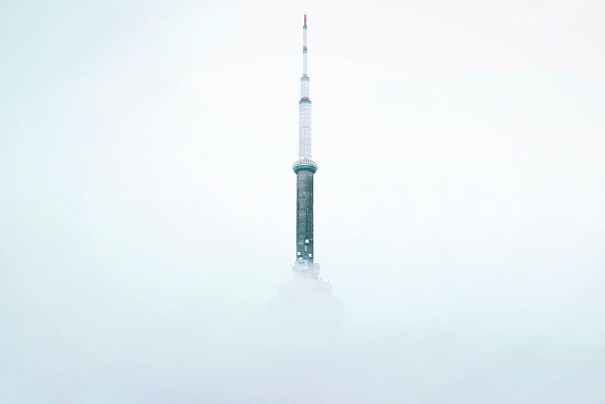 CN Tower Emerging from Thick Fog in Toronto