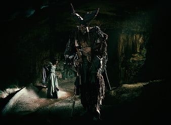 Dark fantasy demon and woman in a cave