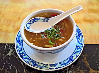 Chinese Sour Spicy Soup in Blue and White Porcelain Bowl