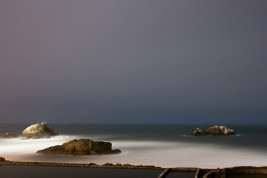 Long Exposure Misty Ocean Rocks at Dusk