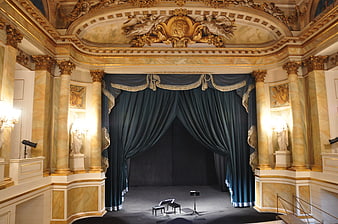 Grand Baroque Theater Stage with Blue Curtains and Gold Columns