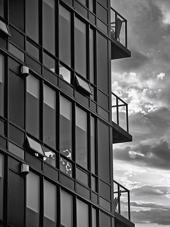 Modern Black and White Apartment Building Facade with Balconies