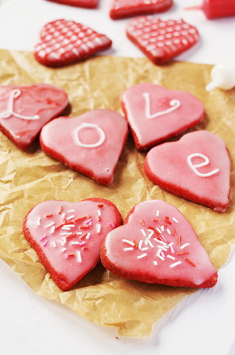 Heart-shaped Valentine's Day cookies with love lettering