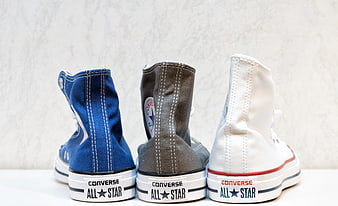 Rear View of Blue, Gray, and White Converse All Star High-Top Sneakers