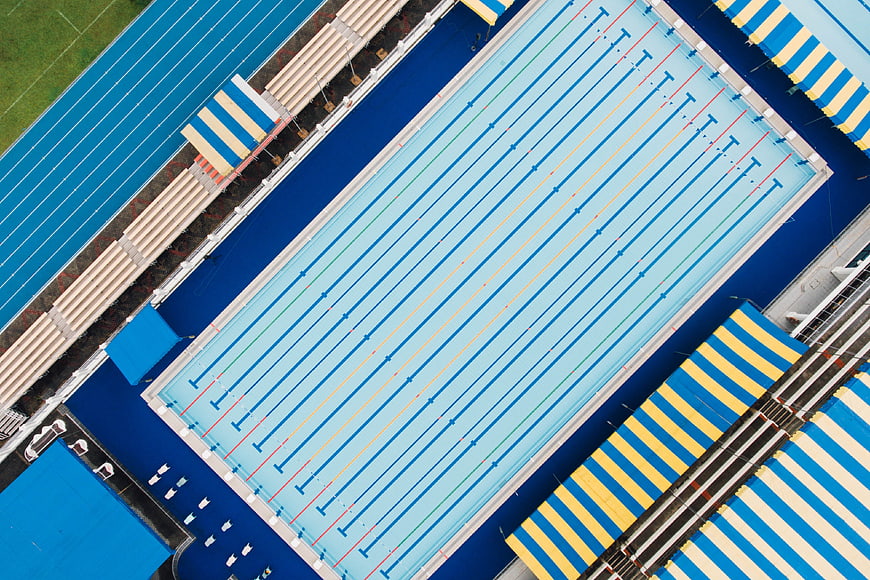 Aerial View of Empty Olympic Swimming Pool with Lanes