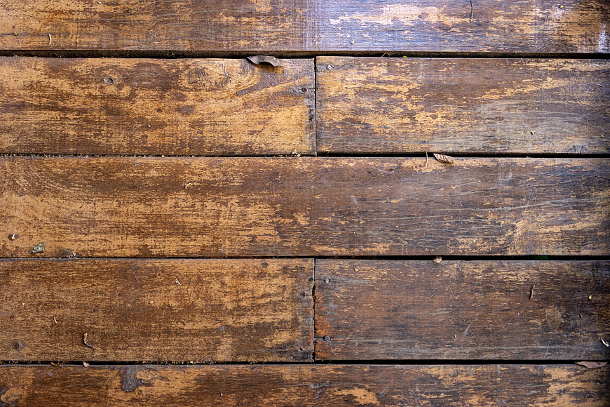 Weathered wooden deck planks background texture