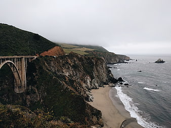 Bixby Creek Bridge on Big Sur Coastline with Foggy Ocean View