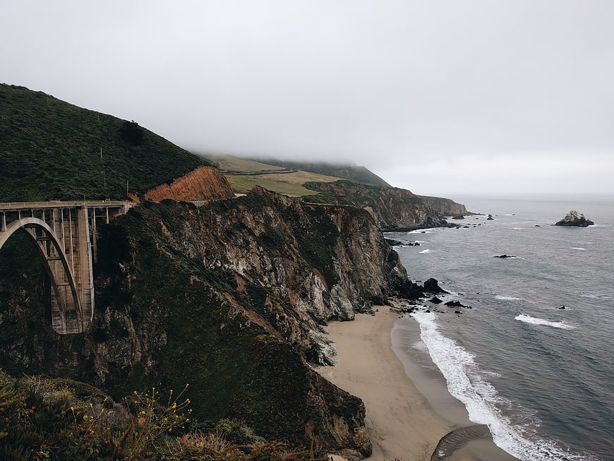 Bixby Creek Bridge on Big Sur Coastline with Foggy Ocean View