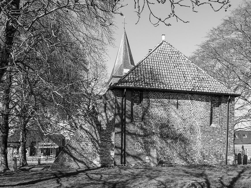 Black and white photo of historic Dutch brick church