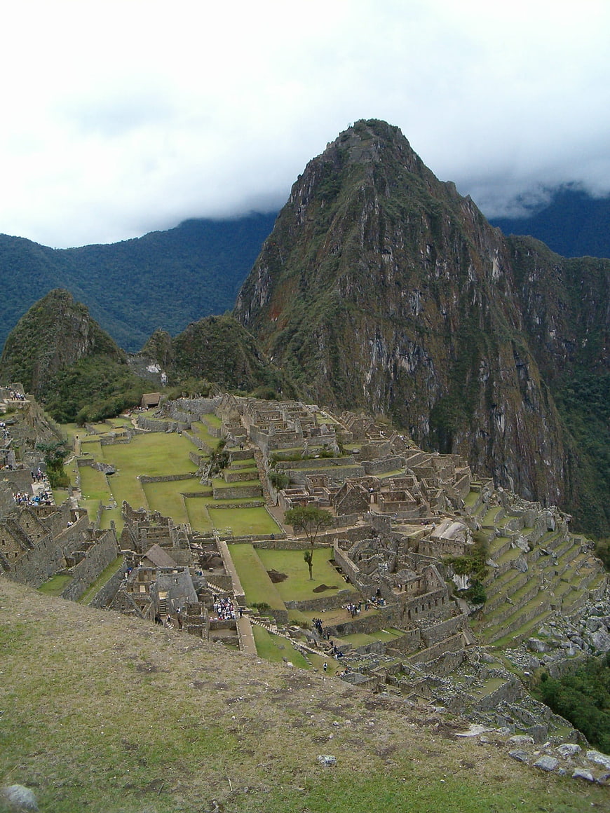 Machu Picchu ruins with Huayna Picchu mountain background