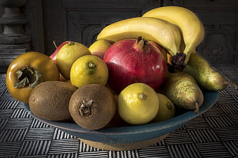 Rustic Ceramic Bowl Filled With Fresh Assorted Fruit Still Life