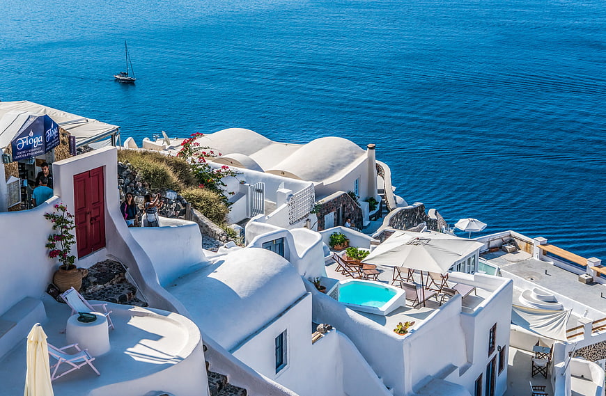White Cycladic Architecture Overlooking Blue Aegean Sea