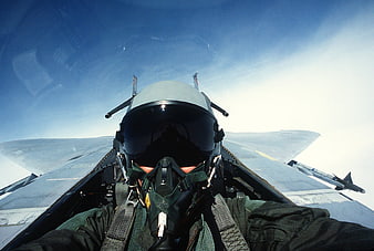 Fighter Pilot Cockpit View During High-Altitude Jet Flight