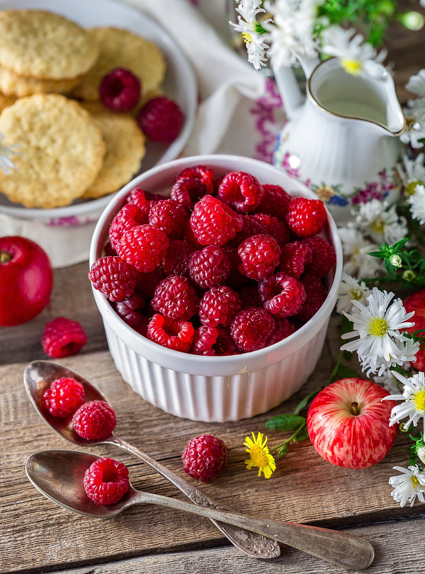 Fresh Raspberries in White Bowl with Apples and Cookies