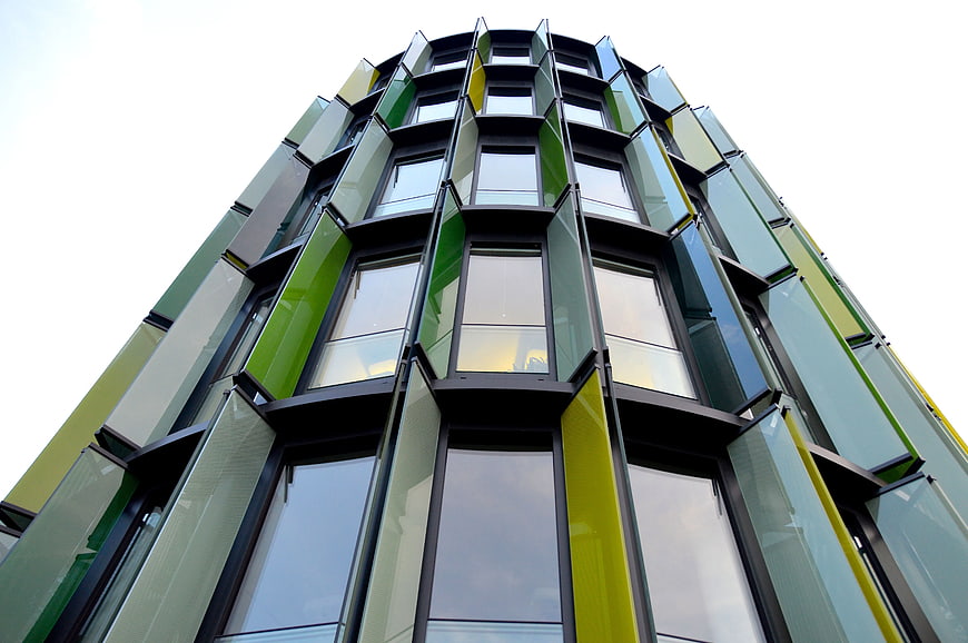 Low Angle View of Modern Green Glass Office Building