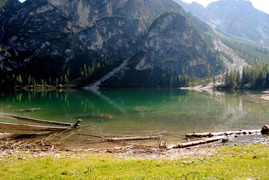 Serene Alpine Lake with Emerald Waters and Mountain Reflections