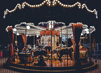Vintage Carousel at Night with Bright Lights