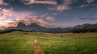 Dramatic Sunset Over Dolomites Mountain Landscape