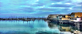 Panoramic View of Harbor with Boats and Waterfront Buildings