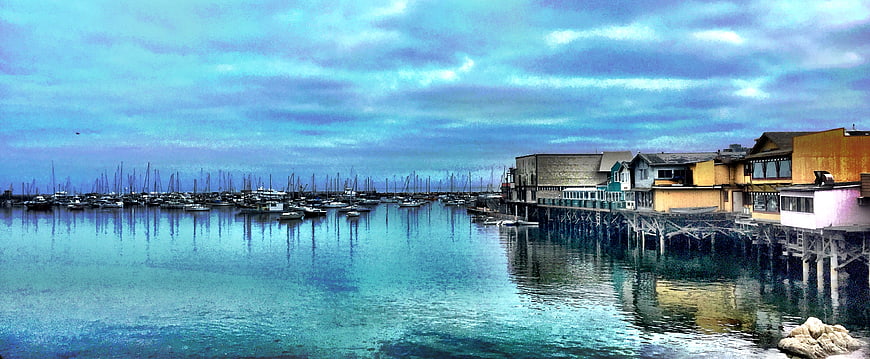 Panoramic View of Harbor with Boats and Waterfront Buildings