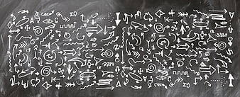 Hand-drawn white chalk arrows and symbols on a dark blackboard background