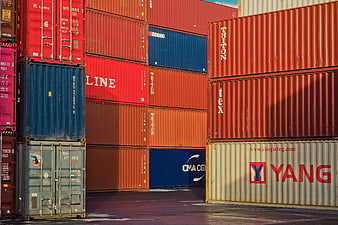 Colorful Stacked Shipping Containers At Port