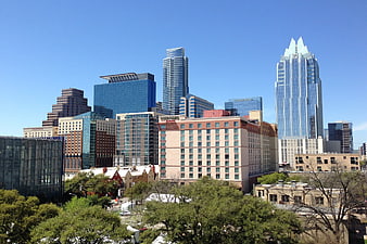 Austin Texas skyline with Frost Bank Tower and blue sky