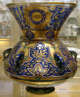 Ornate Middle Eastern Ceramic Vase with Blue and Gold Patterns