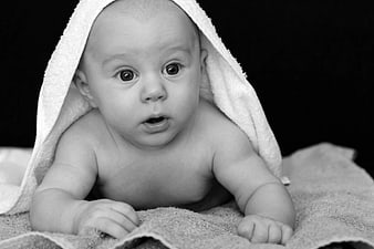 Cute Baby Wrapped in Towel Black and White Portrait