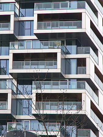 Modern Apartment Building Facade with Glass Balconies