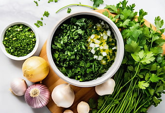 Fresh Chopped Cilantro, Onions, and Garlic on Wooden Board